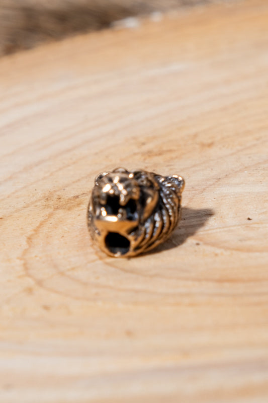 Perle de barbe lion, bronze