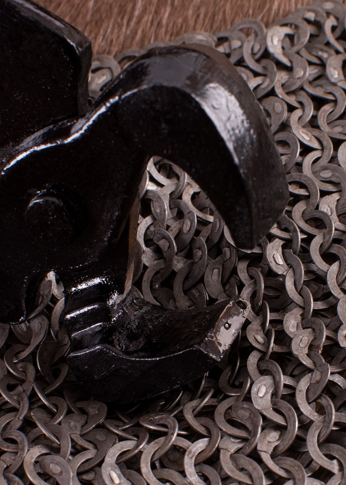 Ringbrynjestång för kilformade nitar