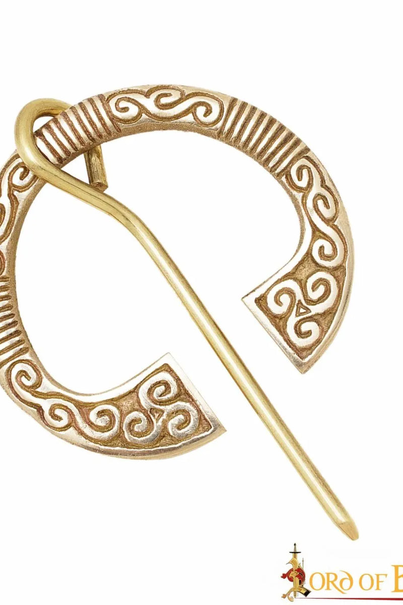 Fíbula celta de herradura, latón