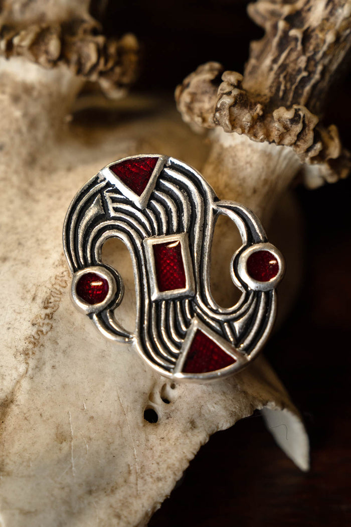 Merovingian S-fibula, silvered bronze