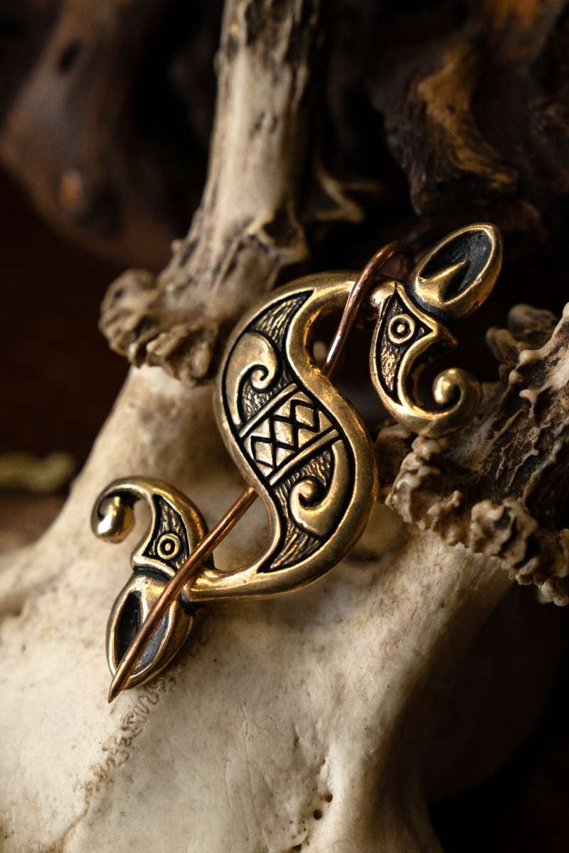 Fibule gallo-romaine à hippocampe, bronze