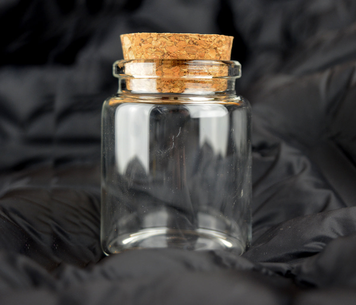 Petit pot rond en verre historique