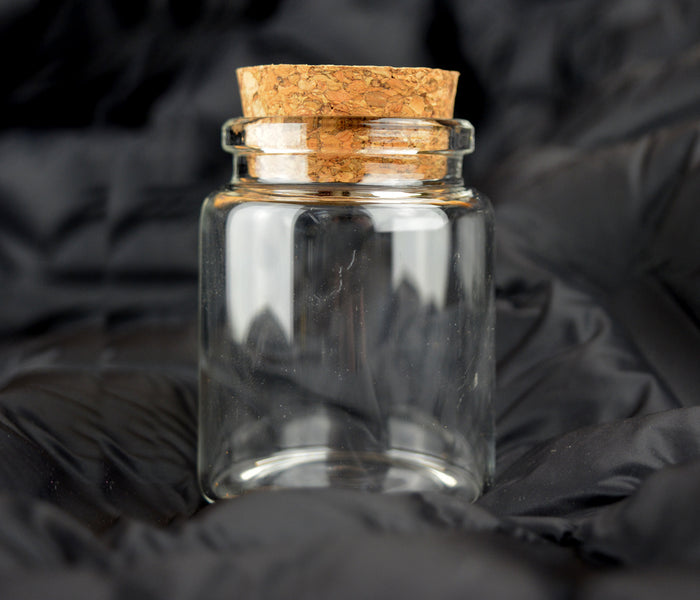 Petit pot rond en verre historique