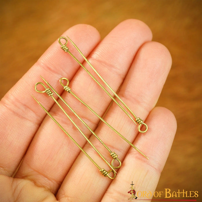 Pins, six pieces, bronze