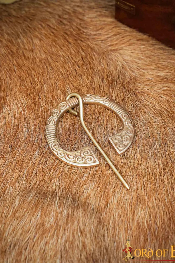 Fibule en fer à cheval celtique, laiton