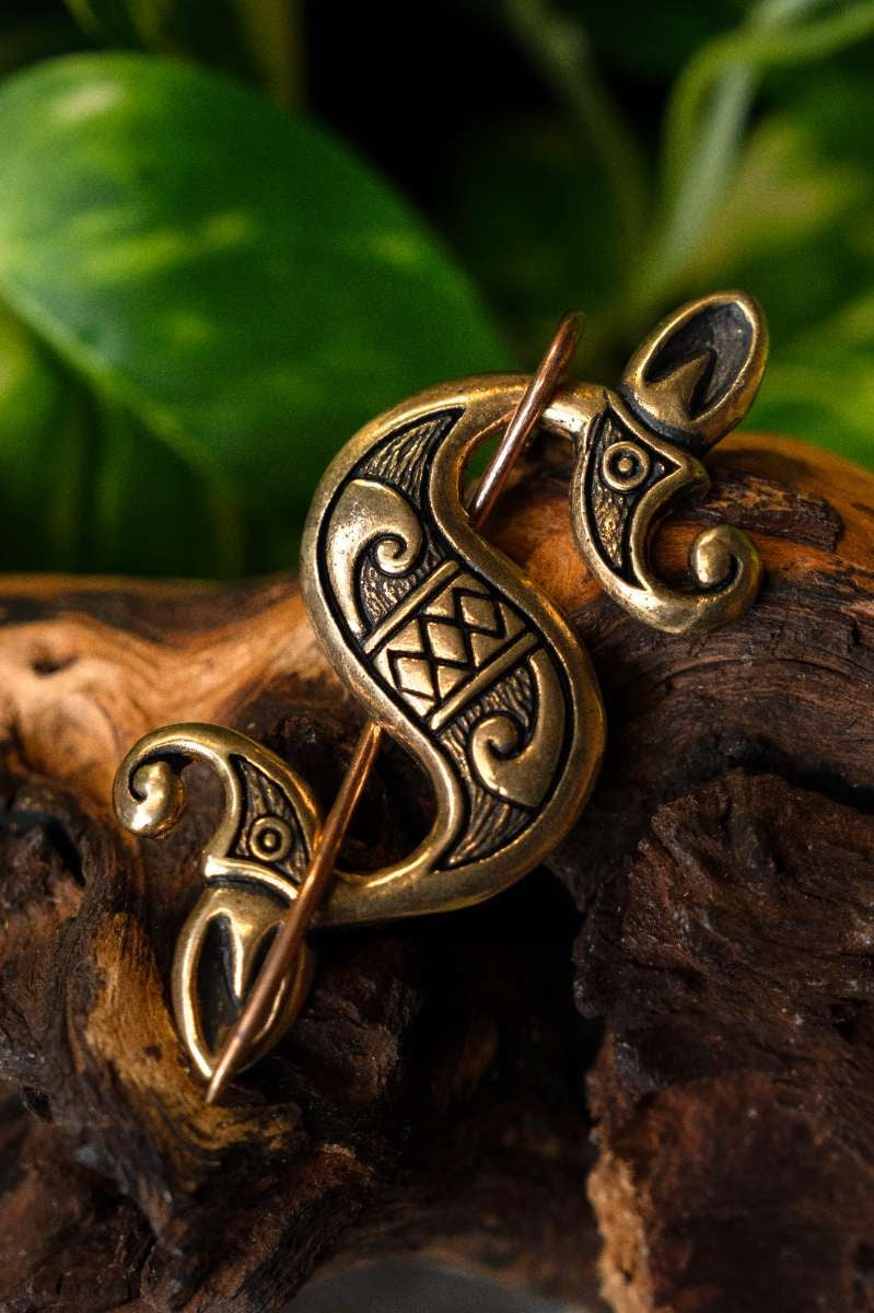 Fibule gallo-romaine à hippocampe, bronze