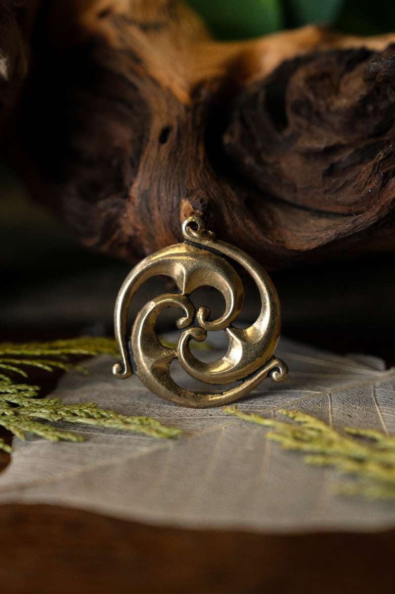 Gallo-Romeinse zonneamulet, brons