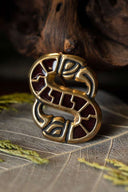Broche lombarde en forme d'oiseau S, bronze