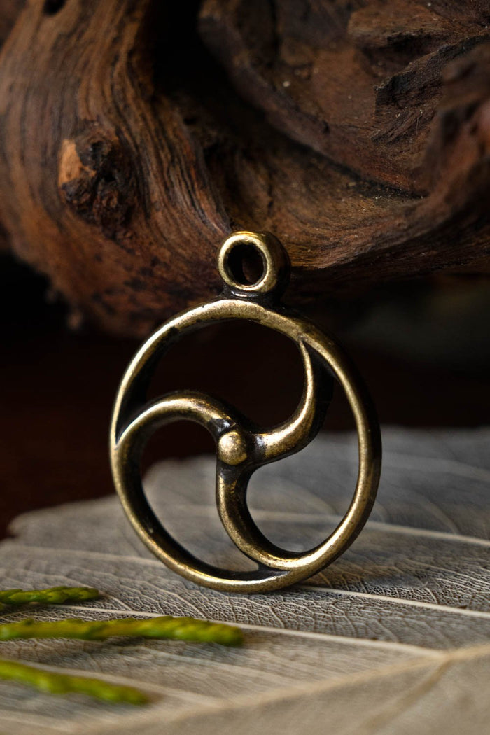 Amulette solaire celtique, bronze