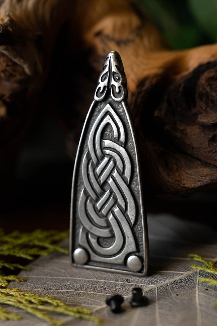 Viking belt end Borre animal, silvered