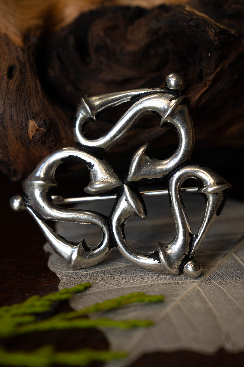 Roman trumpet fibula, silvered bronze