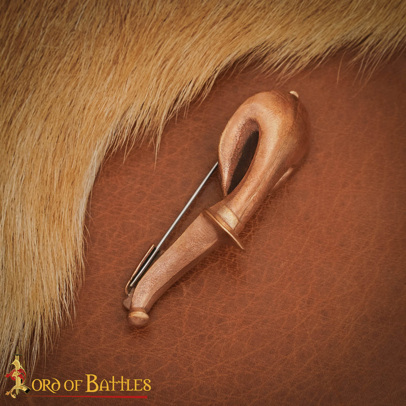 Trompetfibula (buefibula), 1.–4. århundrede, bronze