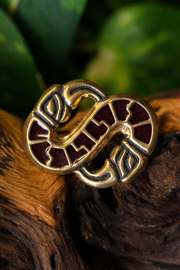 Broche lombarde en forme d'oiseau S, bronze