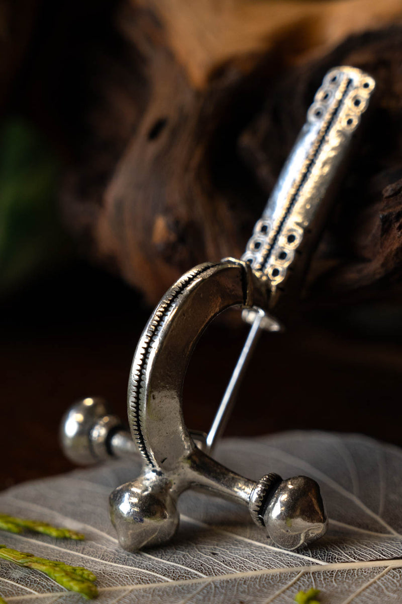 Fibula romana a balestra, bronzo argentato