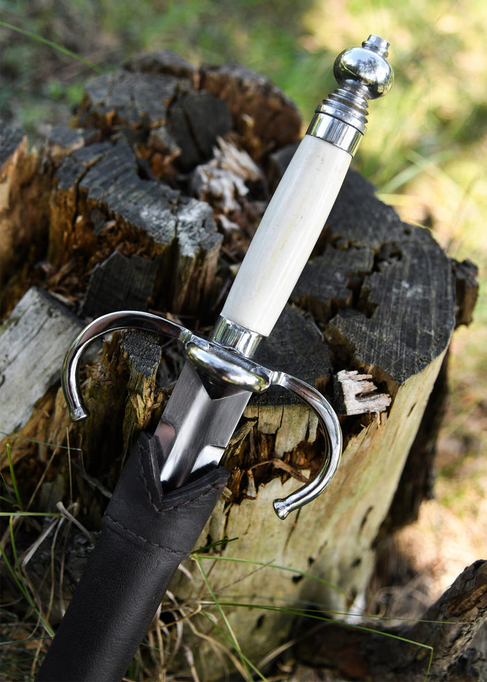 Main gauche med benhåndtag, halvskarpt