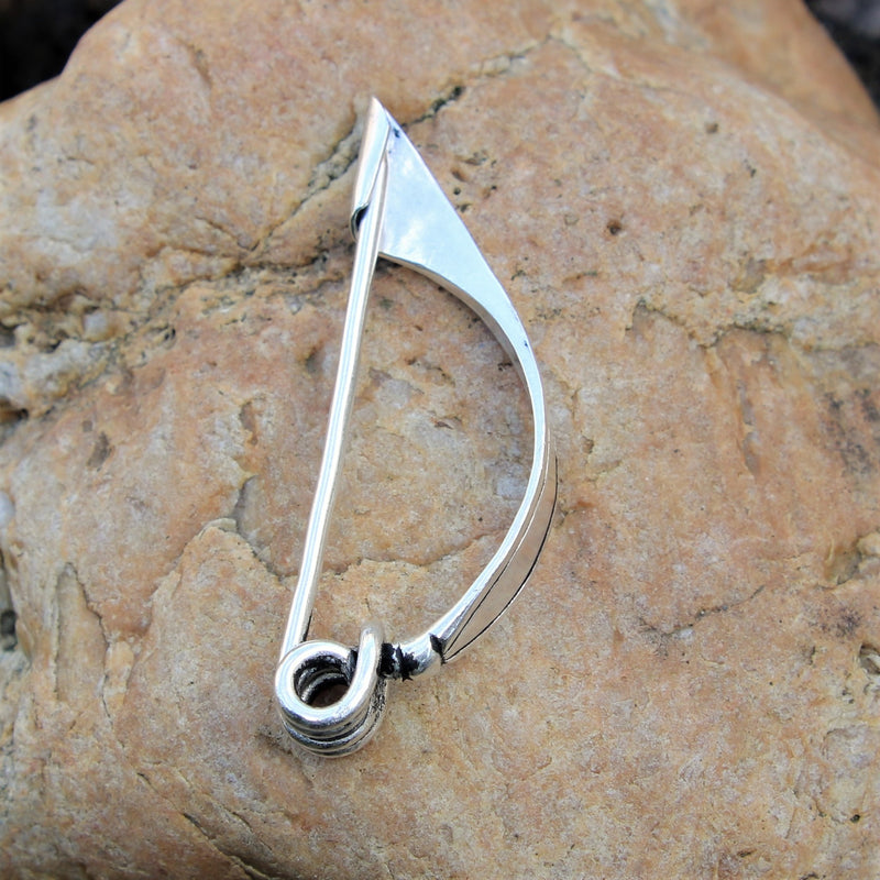 Celtic bow fibula, 3rd–1st century BC, silvered bronze