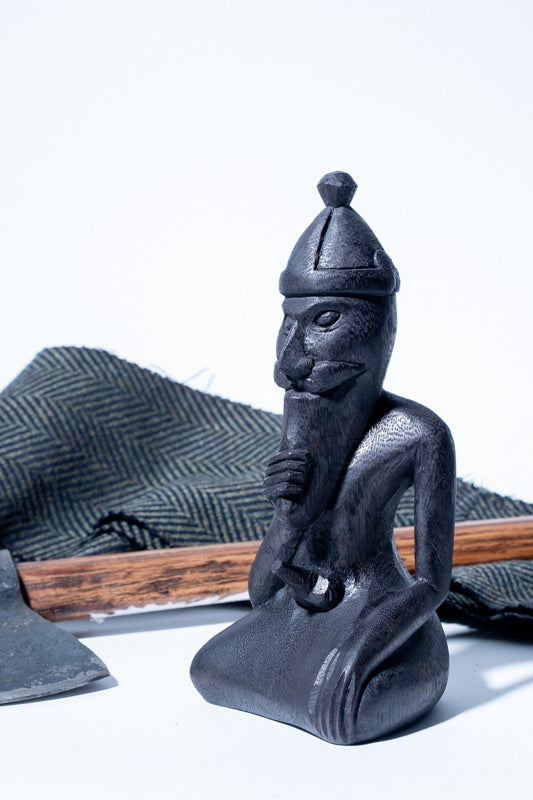 Wood carving Viking god Freyr