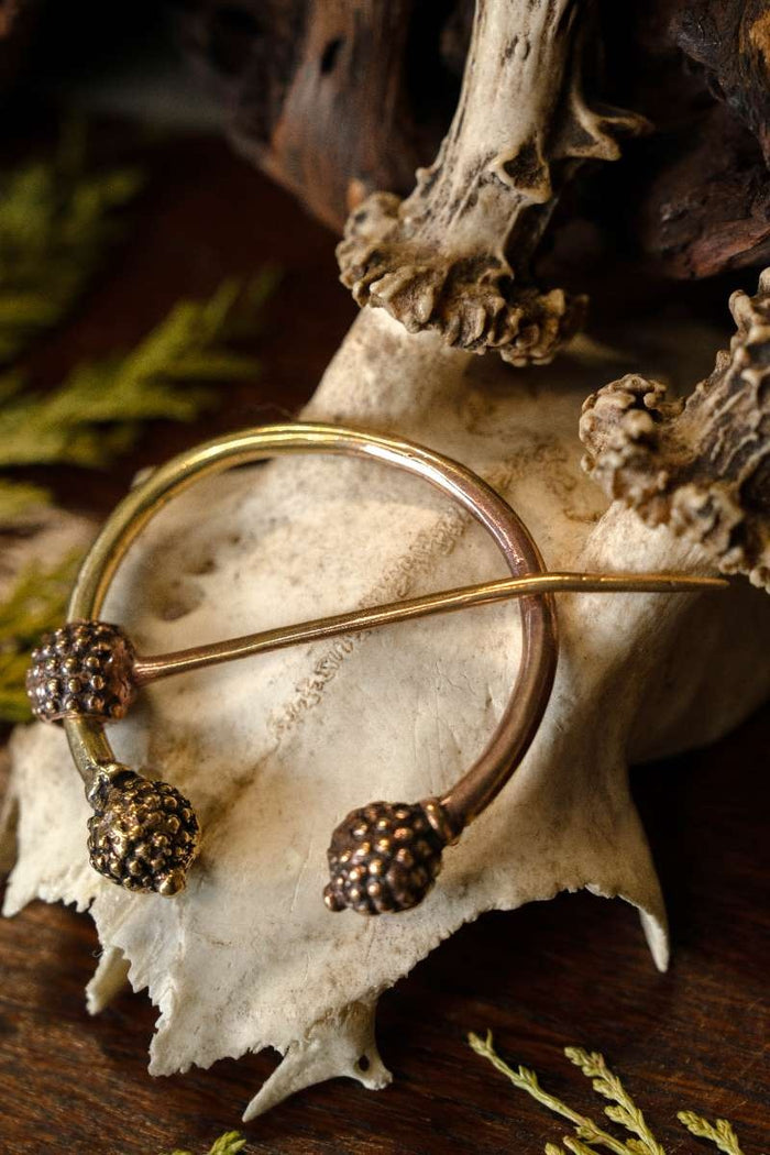 Celtic thistle fibula, bronze