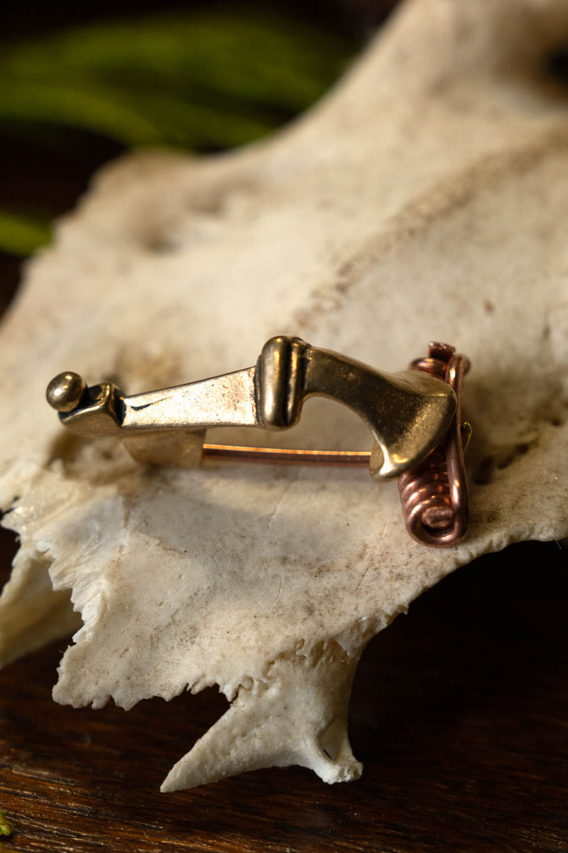 Fibula kuszowata Lîmes (40–70 n.e.), zamak