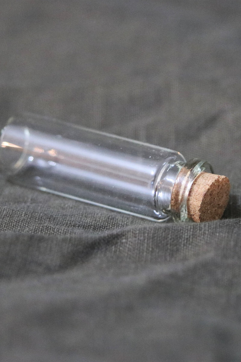 Glass bottle 2x6 cm
