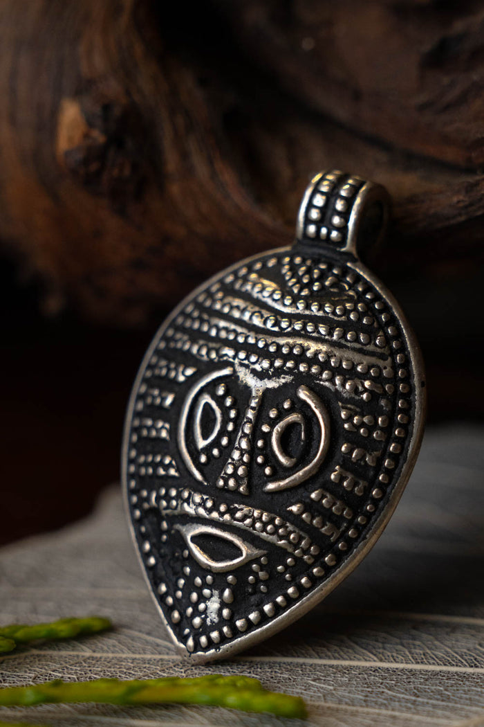 Viking mask amulet Gotland, silvered bronze