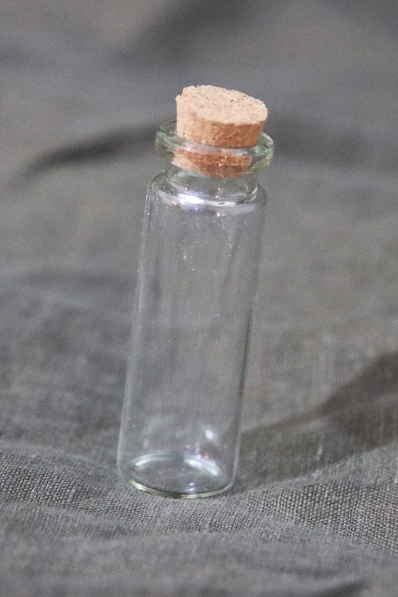 Glass bottle 2x6 cm
