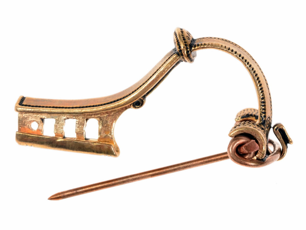 Germánský svitkový uzávěr fibula, Putensen, postříbřený bronz