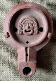 Romersk oljelampa teatermask, Firmalampe